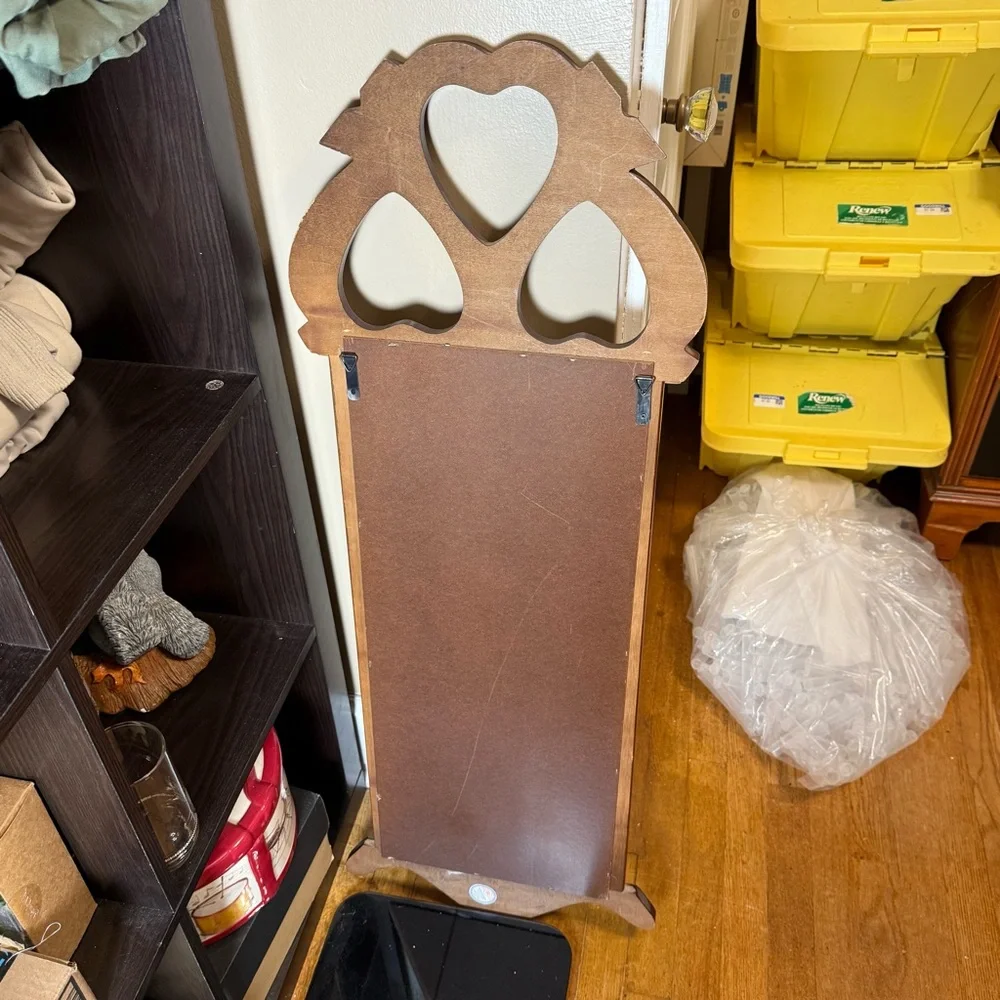 Vintage Dark Finish Wood Frame Mirror with Cut-Out Hearts on Top made by SEI.